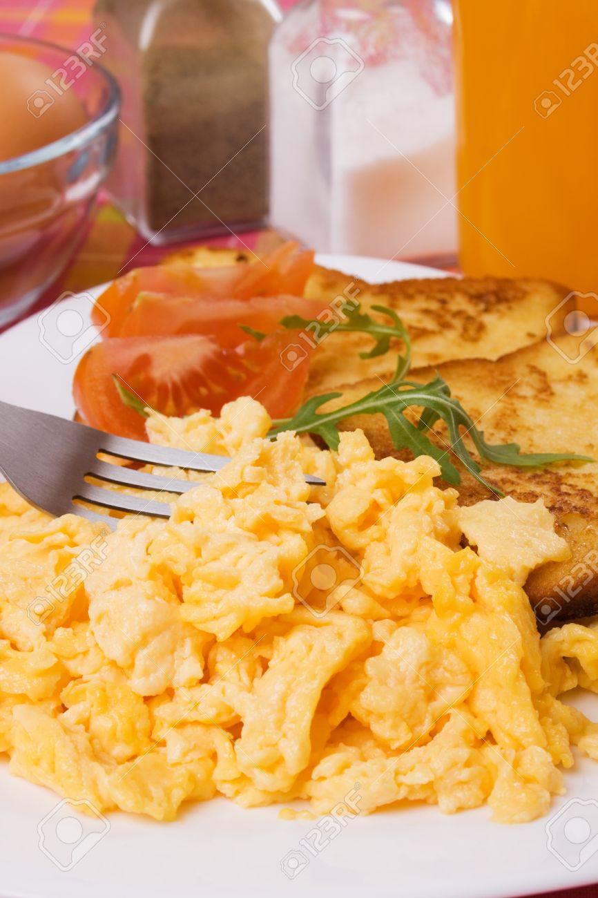Scrambled Eggs Served With Tomato And French Toast For Rich And Stock Photo Picture And Royalty Free Image Image 269