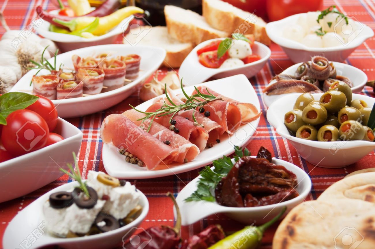 http://previews.123rf.com/images/igordutina/igordutina1110/igordutina111000080/11015870-Antipasto-tapas-various-appetizer-food-traditional-in-meditarranean--Stock-Photo.jpg