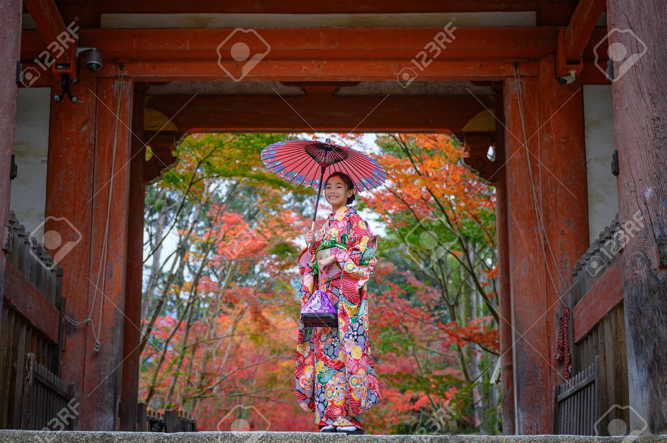 Woman Holding Retro Umbrella In Old