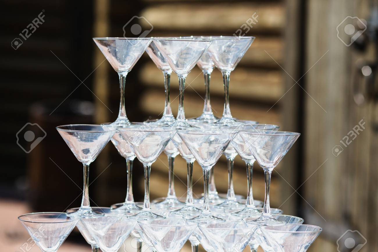 Beautiful Wedding Ceremony Outdoors Empty Wine Glasses On A Table Are A Pyramid Stock Photo Beautiful Wedding Ceremony Outdoors Empty Wine Glasses On A Table Are A Pyramid Stock Photo