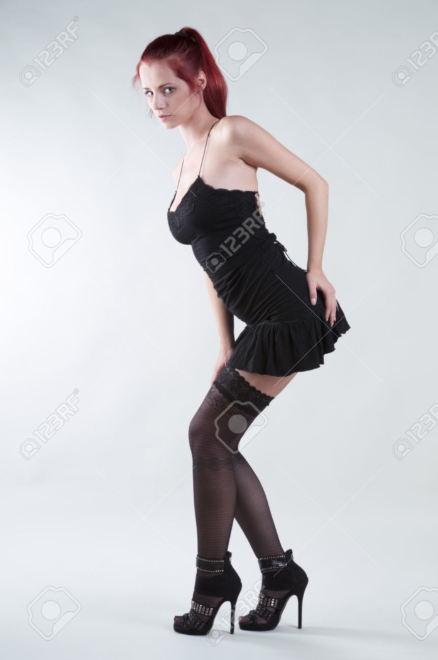 Beautiful Woman in Black Dress and Stockings Stock Image - Image