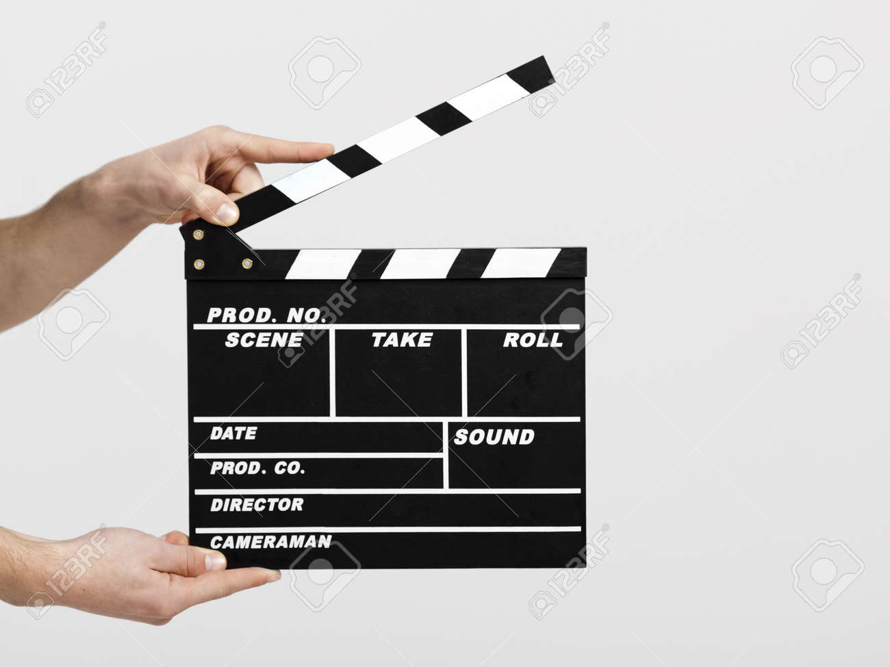 Male hands holding a clapboard, great conceptual image for ex, a new start your business - 13359209 Male hands holding a clapboard, great conceptual image for ex, a new start your business - 13359209