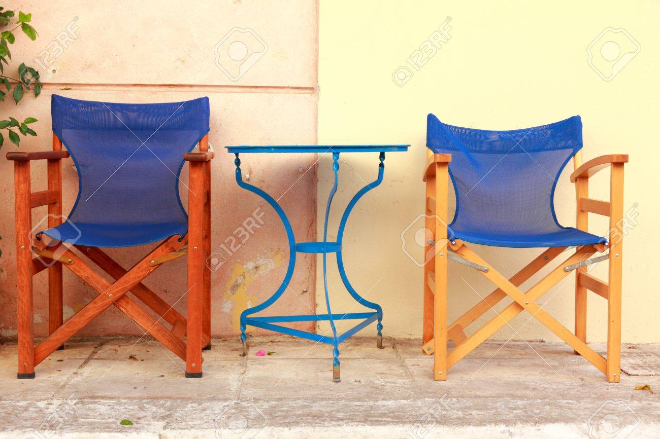 Outdoor Cafe Blue Chairs And Tables In Athens Street Greece