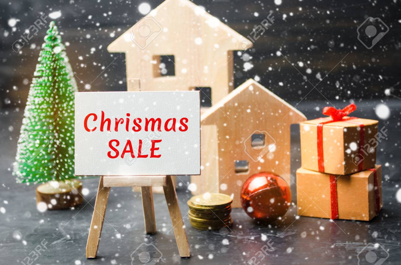 Wooden Houses And Christmas Tree With The Inscription Christmas