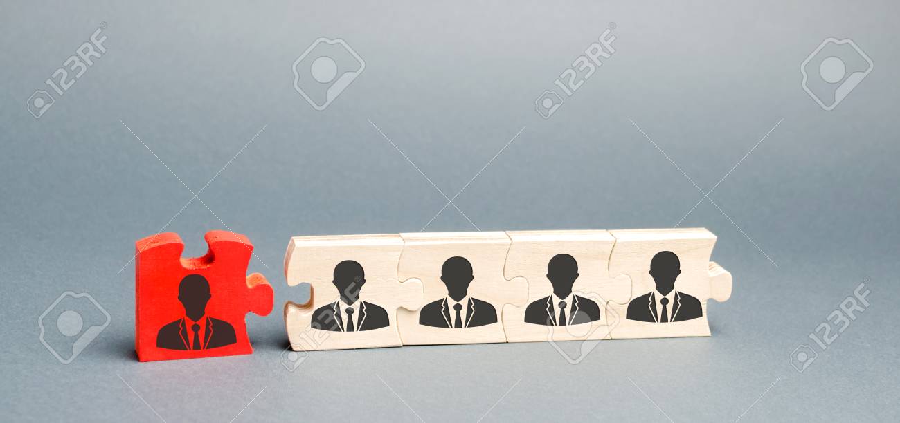 Wooden puzzles with the image of workers. The concept of personnel management in the company. Dismissing an employees from a team. Demotion. Bad worker. Staff cuts. Human resources. Demote - 122679515 Wooden puzzles with the image of workers. The concept of personnel management in the company. Dismissing an employees from a team. Demotion. Bad worker. Staff cuts. Human resources. Demote - 122679515