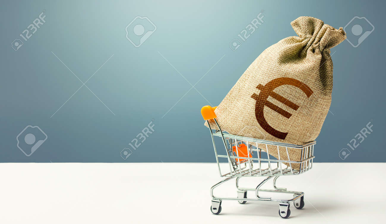 Euro money bag on a shopping cart. Profits and super profits. Loans and microloans. Minimum living wage. Consumer basket. Business and trade concept. Public procurement, budgeting. Economic bubbles - 158572932 Euro money bag on a shopping cart. Profits and super profits. Loans and microloans. Minimum living wage. Consumer basket. Business and trade concept. Public procurement, budgeting. Economic bubbles - 158572932