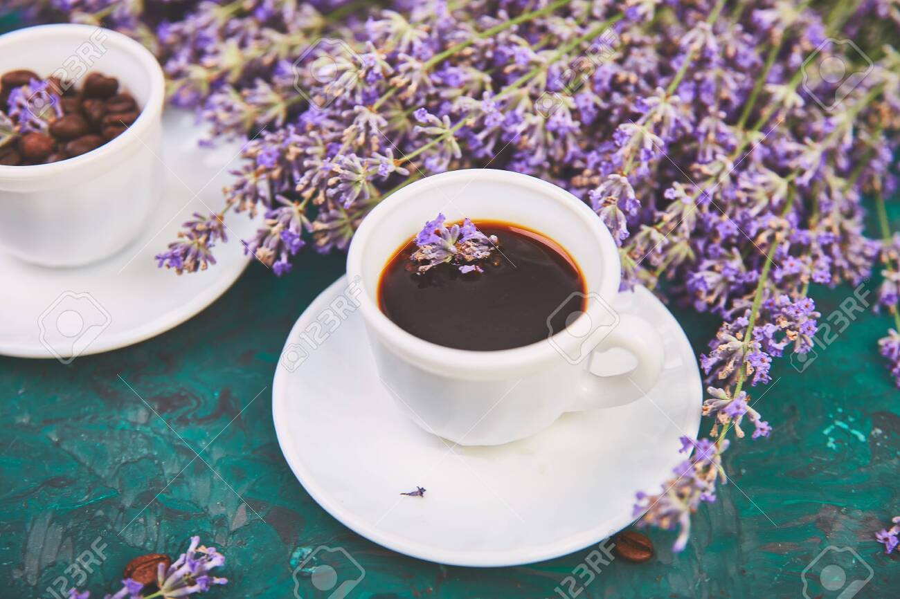 Coffee Coffee Grain In Cups And Lavender Flower On Green