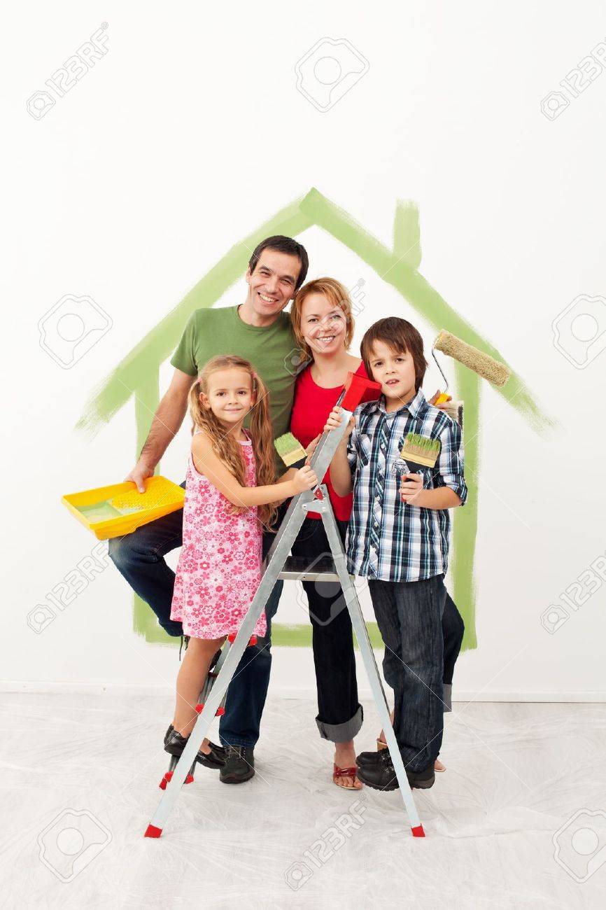 Happy family with kids redecorating their home together - 19505415 Happy family with kids redecorating their home together - 19505415