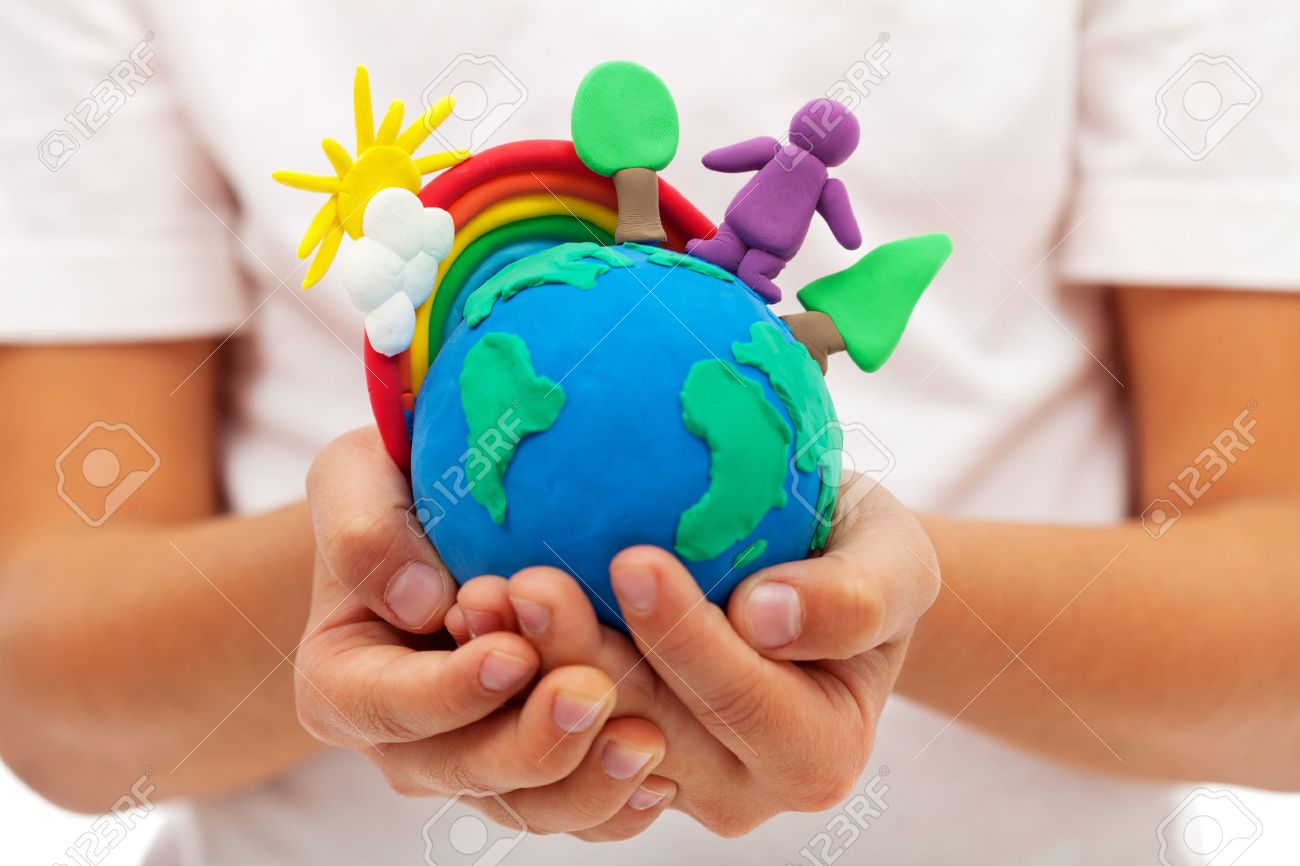Life on earth - environment and ecology concept with clay earth globe in child hands - 24081240 Life on earth - environment and ecology concept with clay earth globe in child hands - 24081240