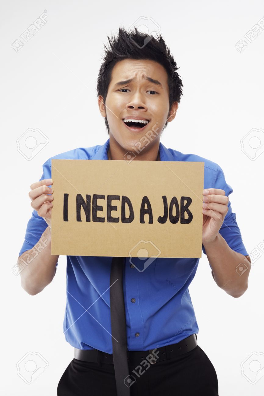 Businessman holding I need a job sign - 17340284 Businessman holding I need a job sign - 17340284