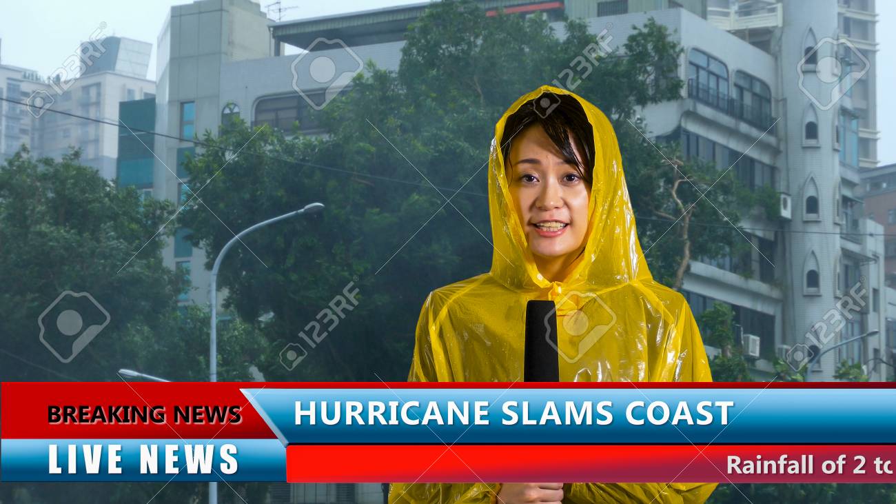 Asian American weather reporter live report in storm - 91439082 Asian American weather reporter live report in storm - 91439082