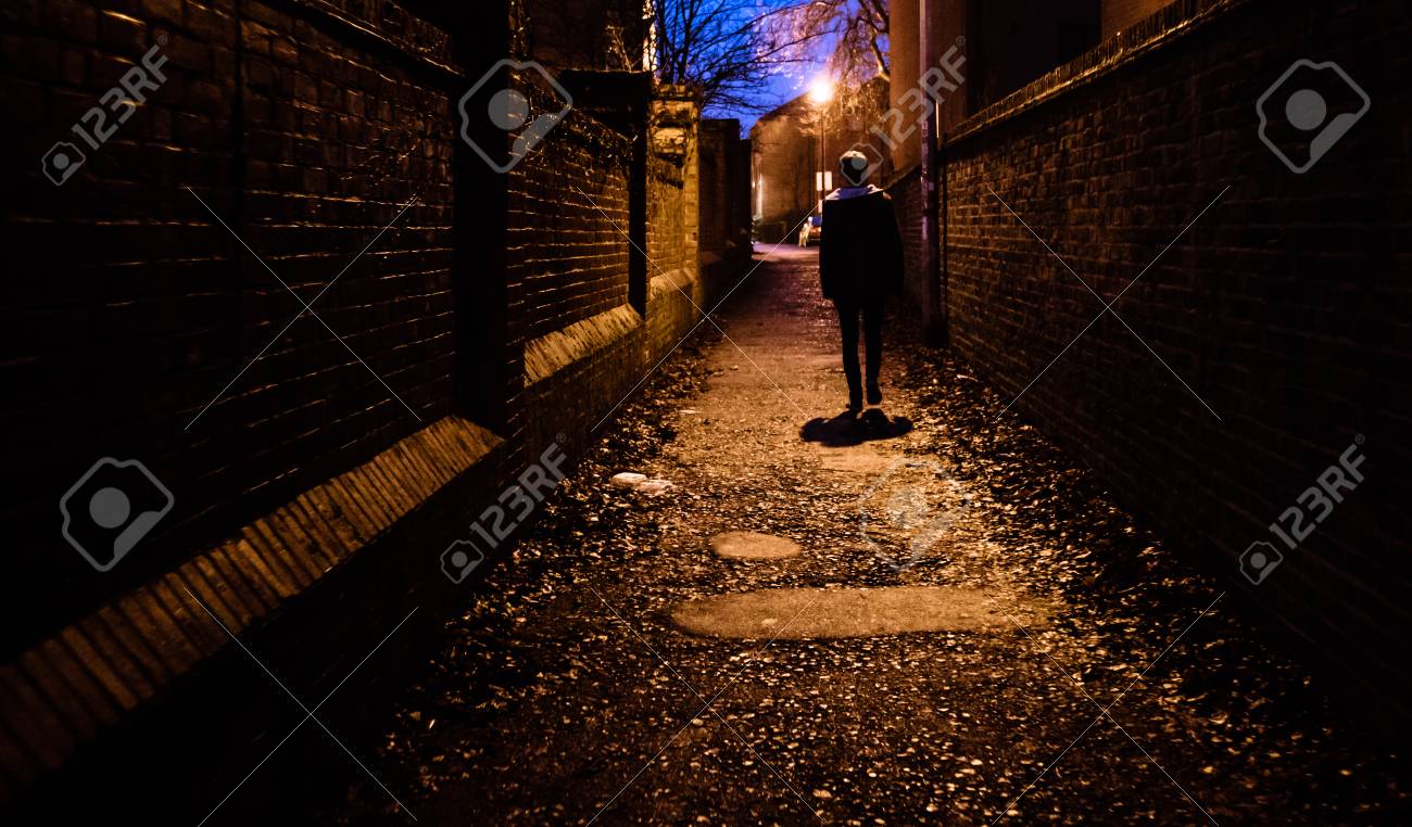 A Young Man Walking Home Alone At Night Through A Dark Alleyway Stock Photo Picture And Royalty Free Image Image A Young Man Walking Home Alone At Night Through A Dark Alleyway Stock Photo Picture And Royalty Free Image Image