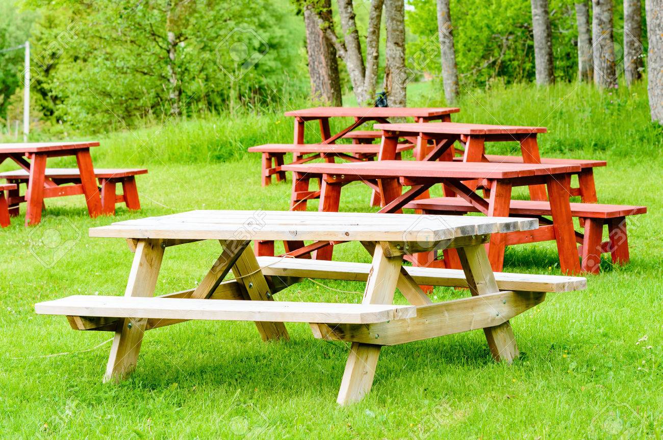 Garden Furniture On Grass red and unpainted garden furniture on green grass with forest Garden Furniture On Grass red and unpainted garden furniture on green grass with forest