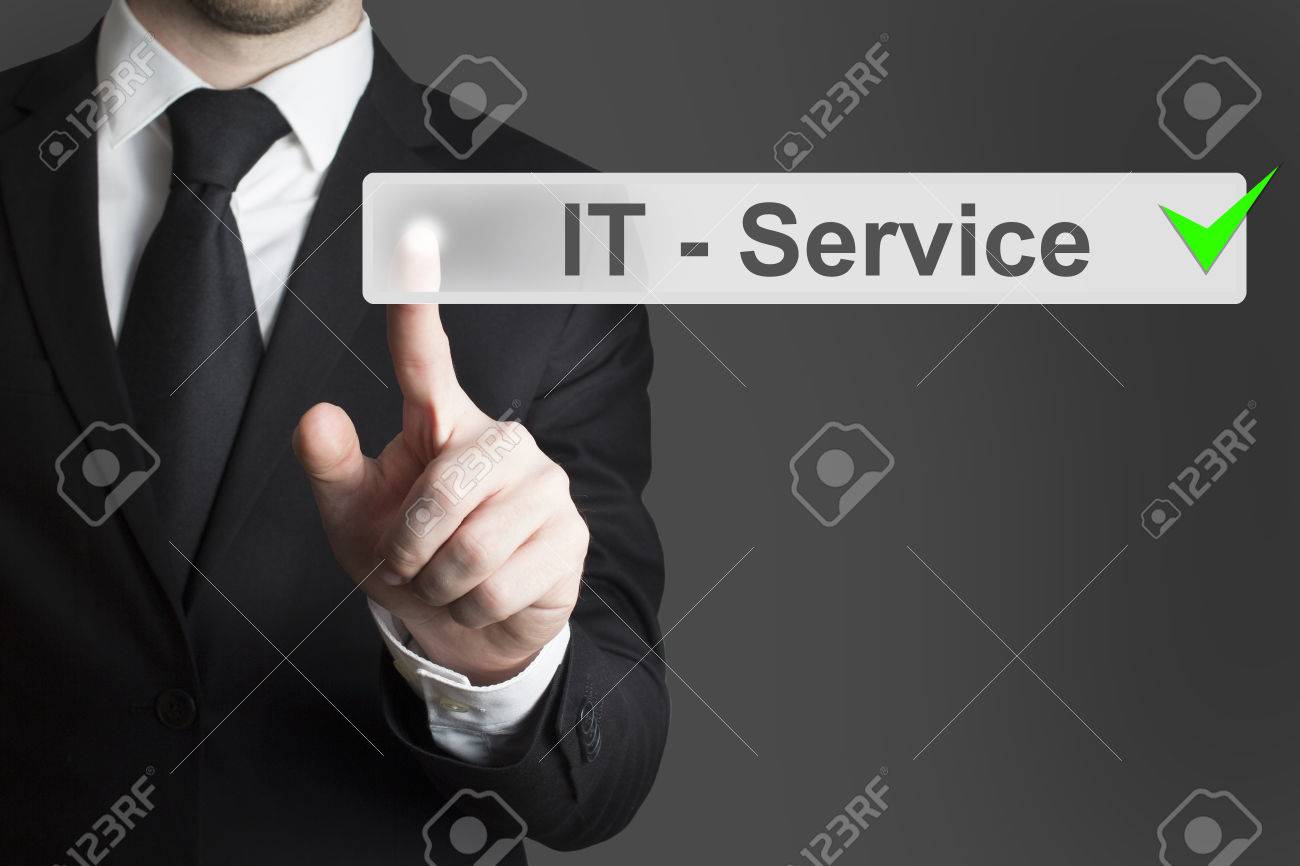 man in black suit specialist pushing button it service checked - 31013540 man in black suit specialist pushing button it service checked - 31013540
