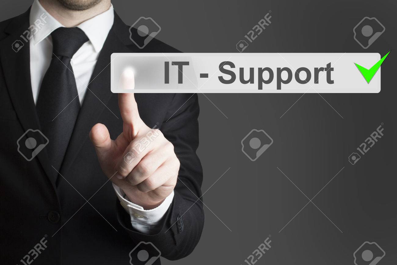 businessman in black suit pushing button it support - 31808281 businessman in black suit pushing button it support - 31808281