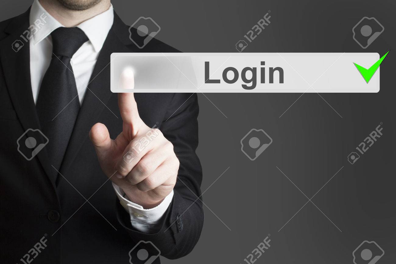 businessman pushing touchscreen button login green checked - 32292828 businessman pushing touchscreen button login green checked - 32292828