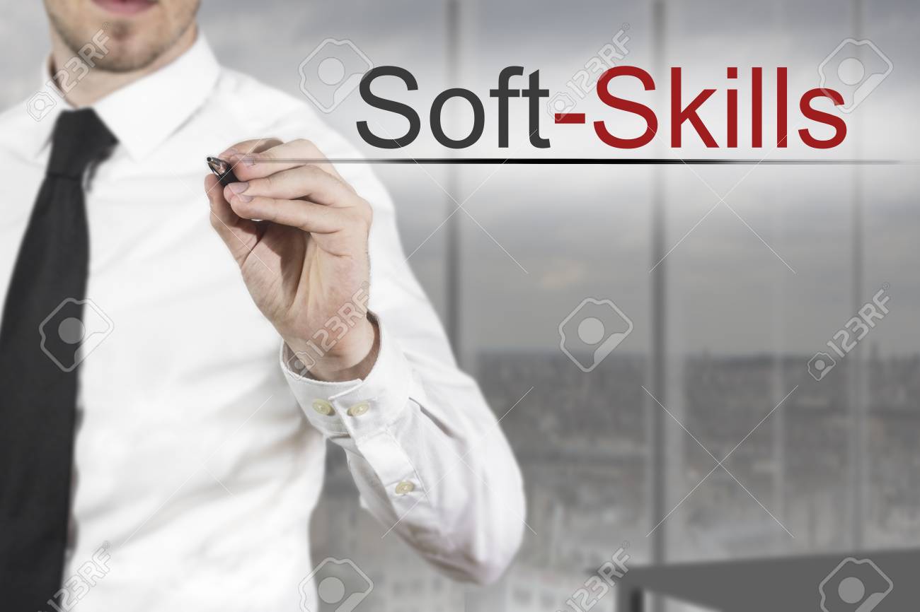 businessman in office room writing soft skills in the air - 33547432 businessman in office room writing soft skills in the air - 33547432