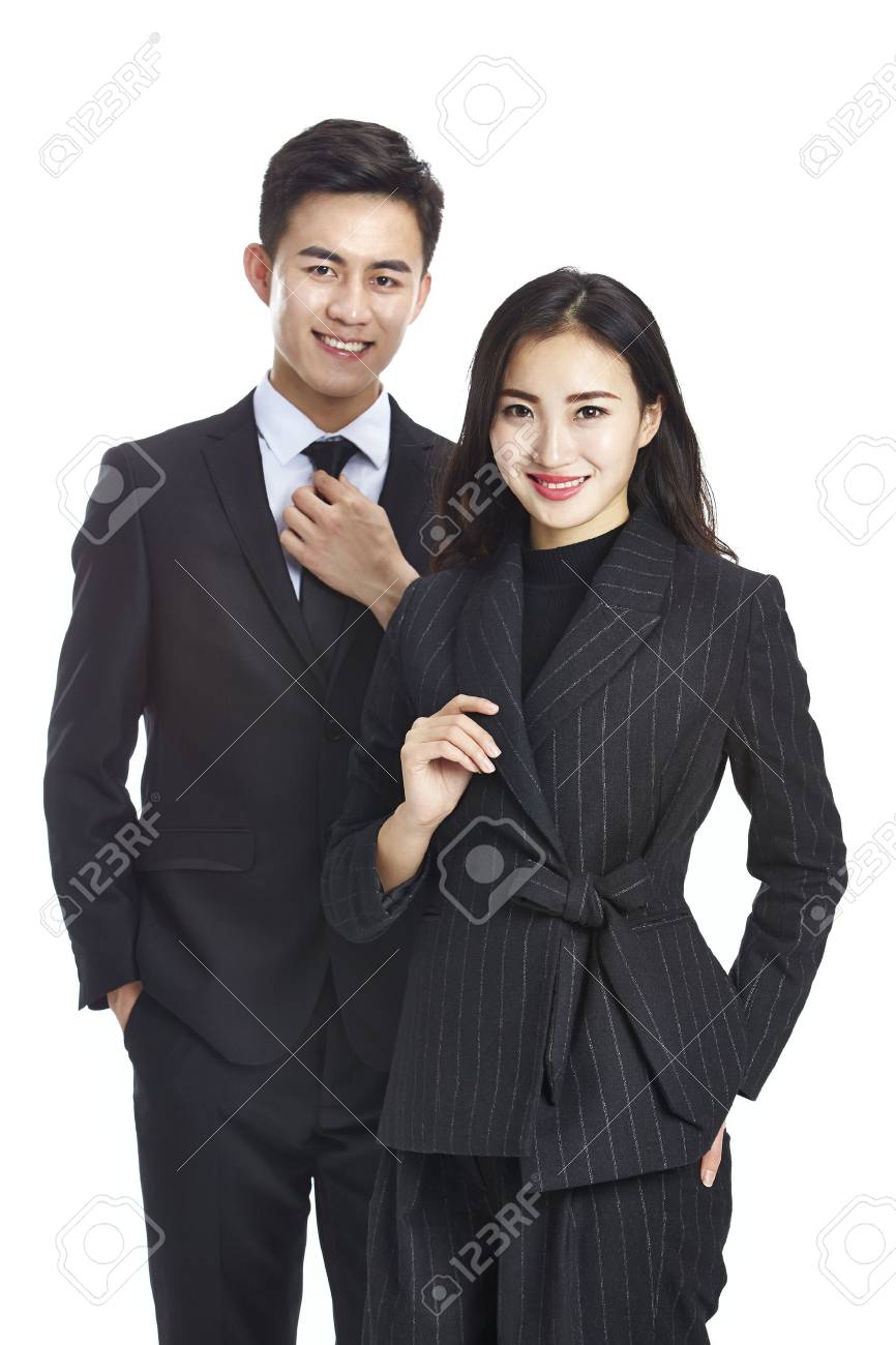 studio portrait of two young asian corporate executive, businessman and businesswoman, looking at camera smiling, isolated on white background. - 92987520 studio portrait of two young asian corporate executive, businessman and businesswoman, looking at camera smiling, isolated on white background. - 92987520