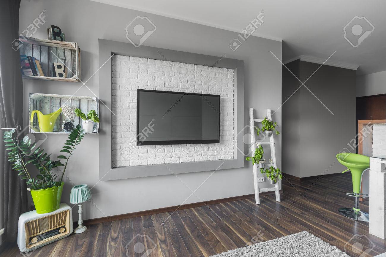 Living Room With Big Tv Hanging On A Decorative Wall With White Stock Photo Picture And Royalty Free Image Image 61823952