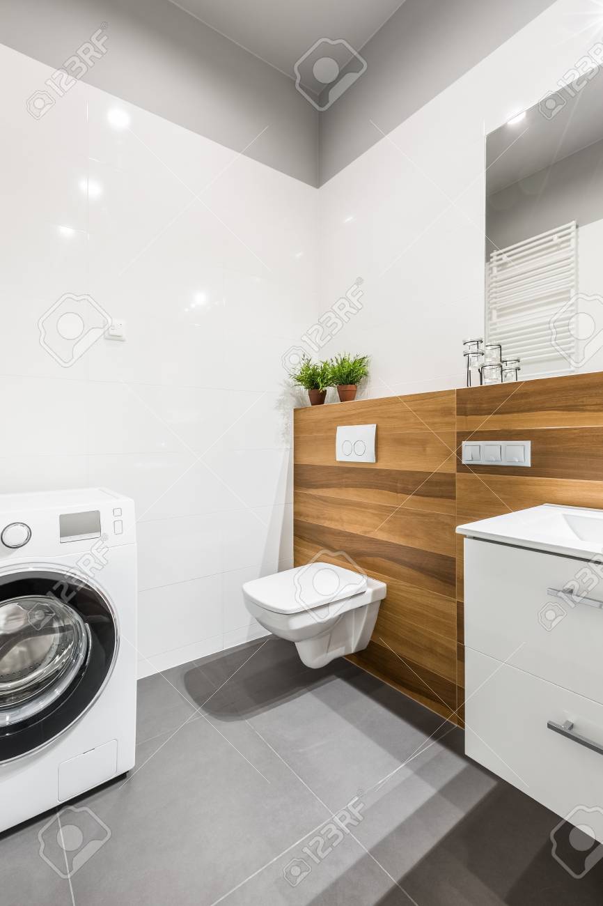 Modern Gray And White Bathroom With Washing Machine Toilet