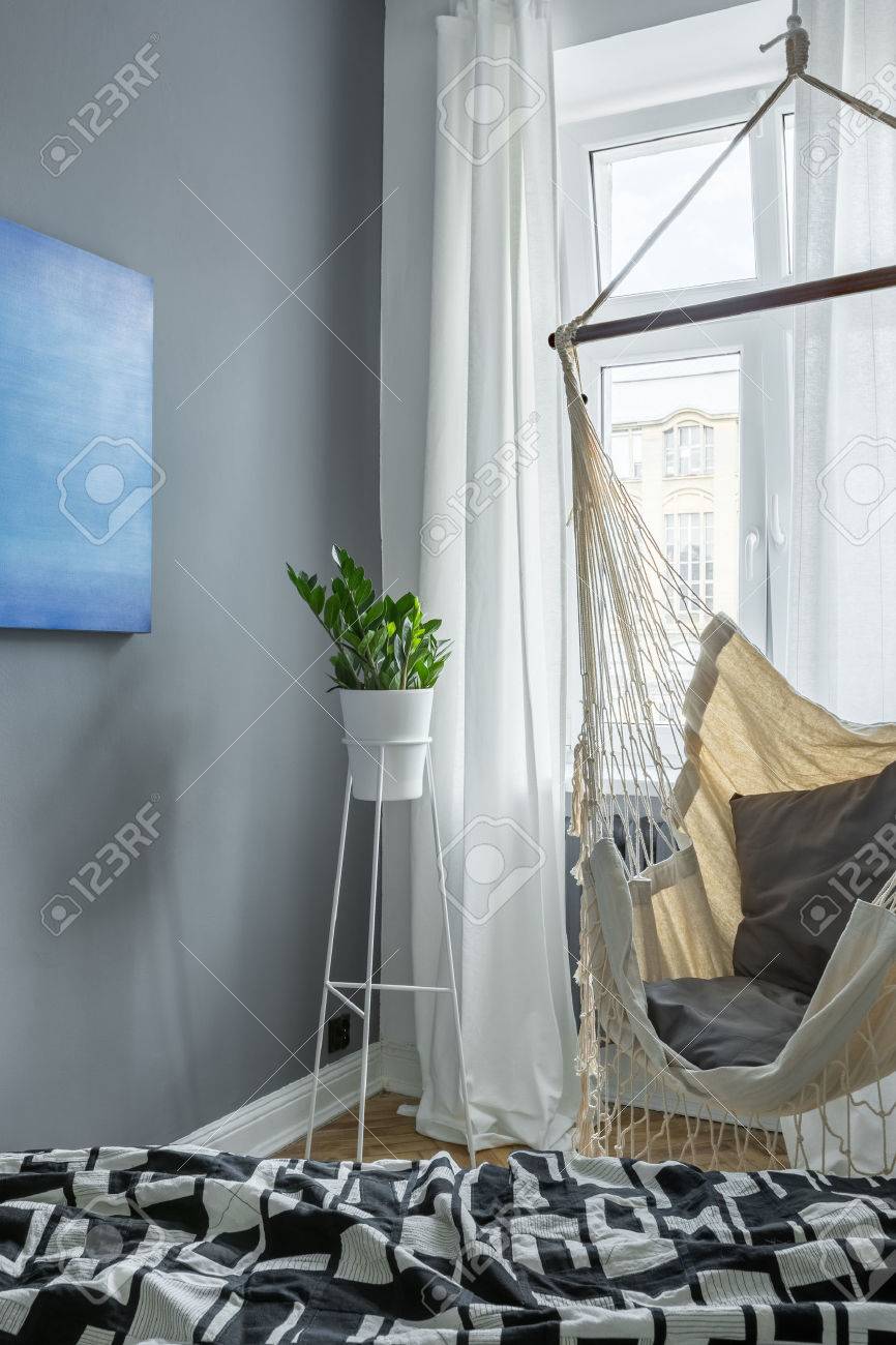 Gray Scandinavian Style Bedroom With Hammock Bed And Window