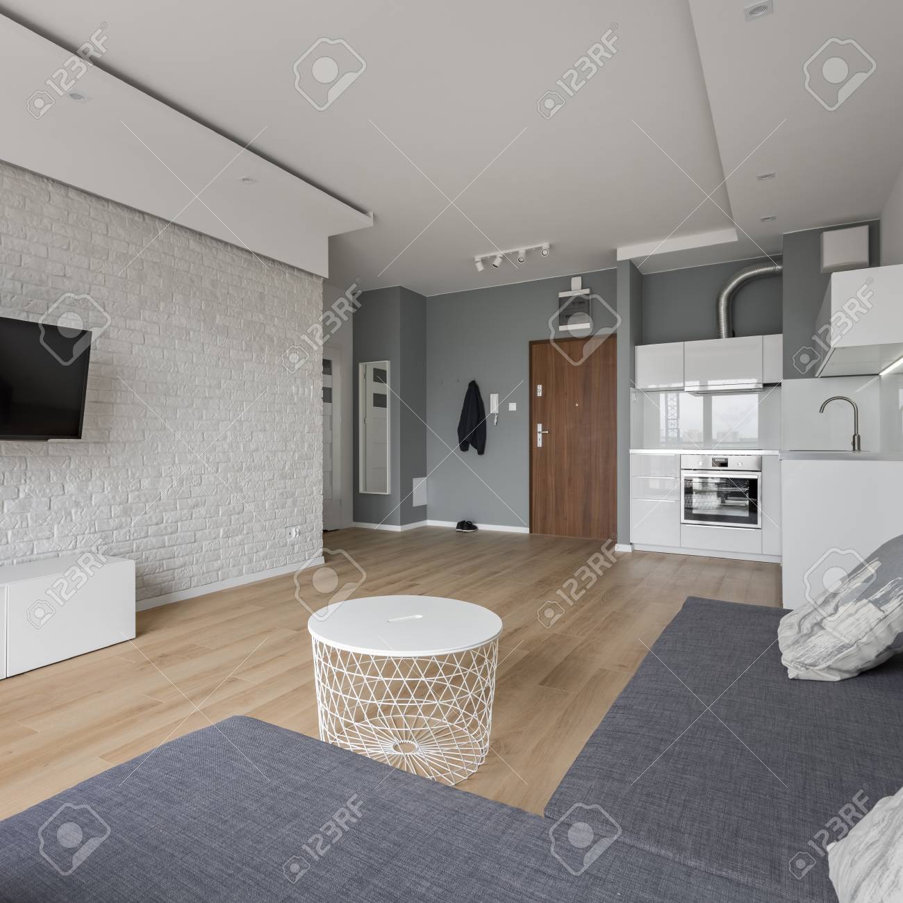 Modern Flat With Tv Room Sofa Coffee Table And Small Open