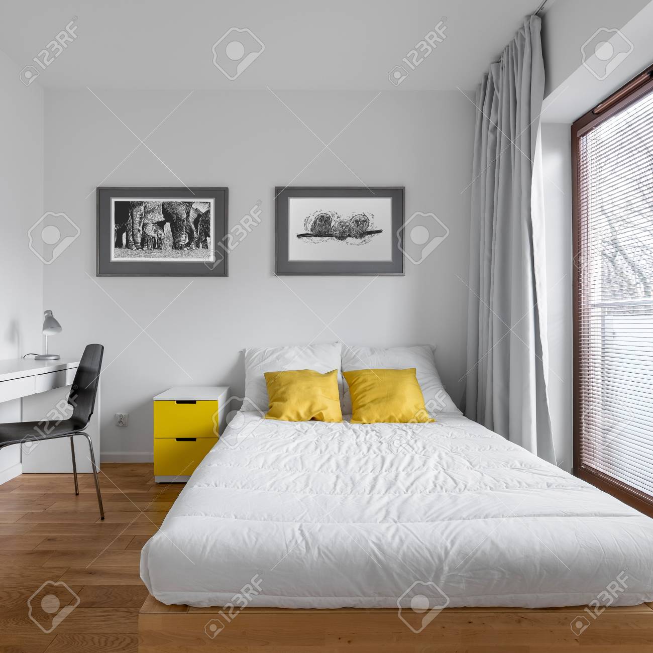 Functional White Bedroom With Bed And Modern Countertop Desk
