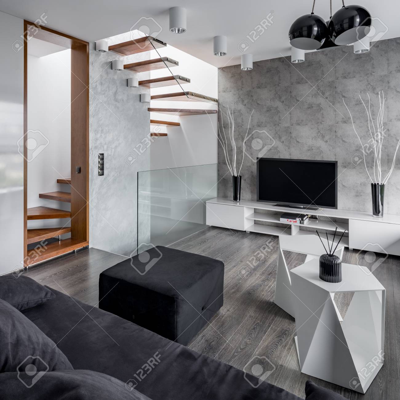 Elegant Living Room With Couch Tv Table And Staircase Stock Photo Picture And Royalty Free Image Image 105231127