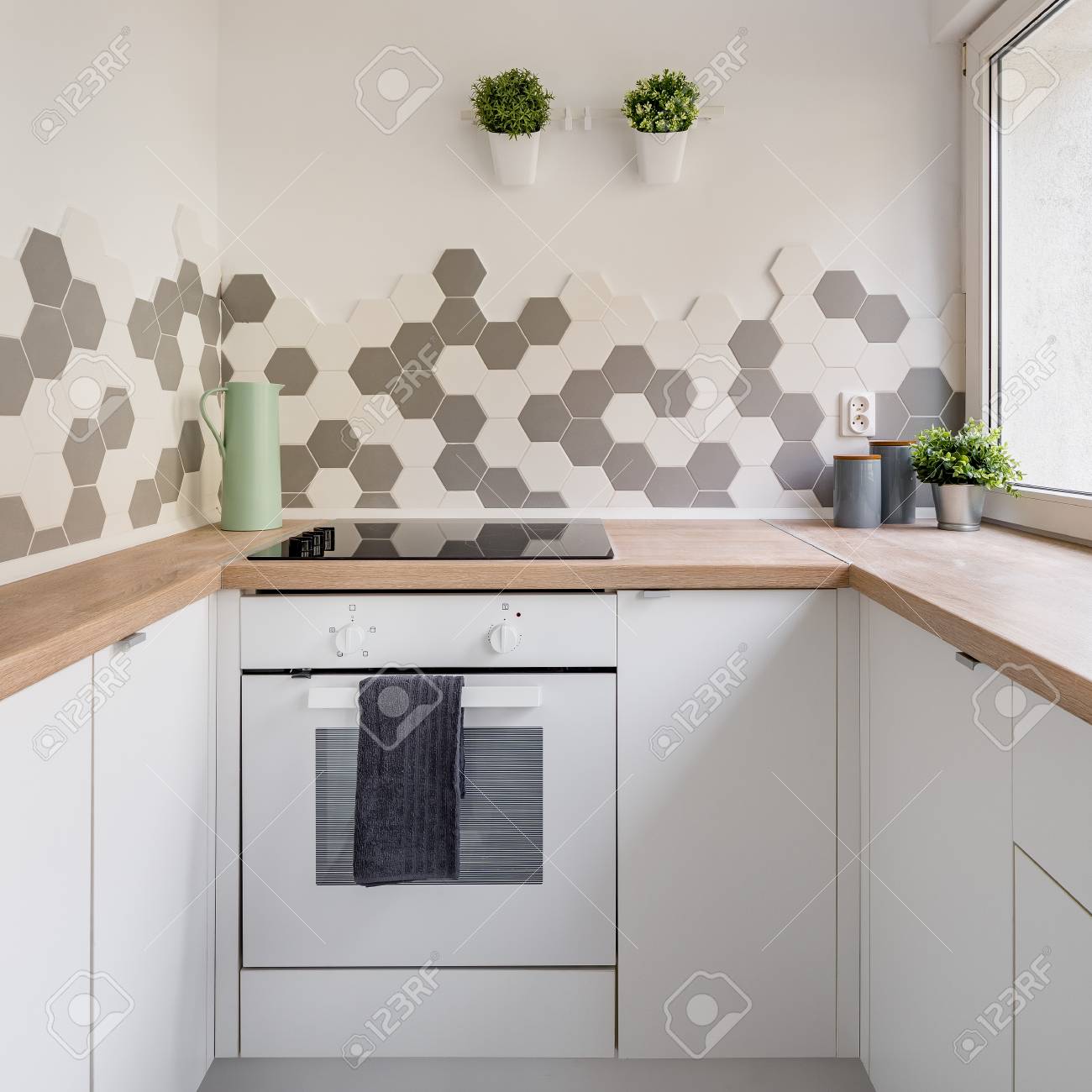 Kitchen In Nordic Style With White Cabinets