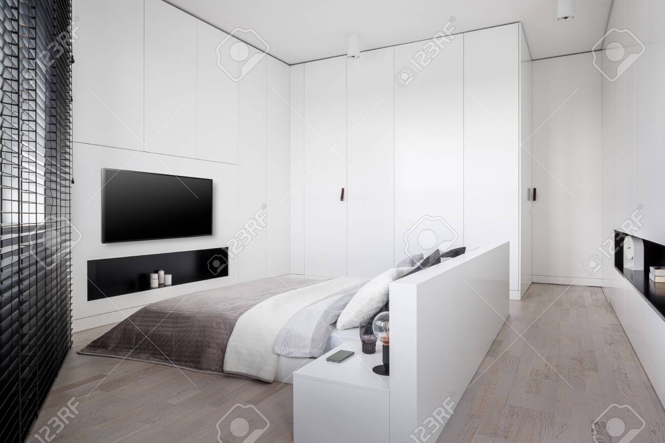Elegant White Bedroom With Big Bed Many Wardrobes And Lockers