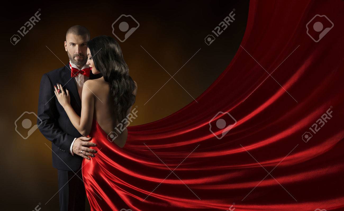 Couple Beauty Portrait, Man in Suit Woman in Red Dress, Rich Lady in Gown, Waving Silk Fabric - 39409338 Couple Beauty Portrait, Man in Suit Woman in Red Dress, Rich Lady in Gown, Waving Silk Fabric - 39409338