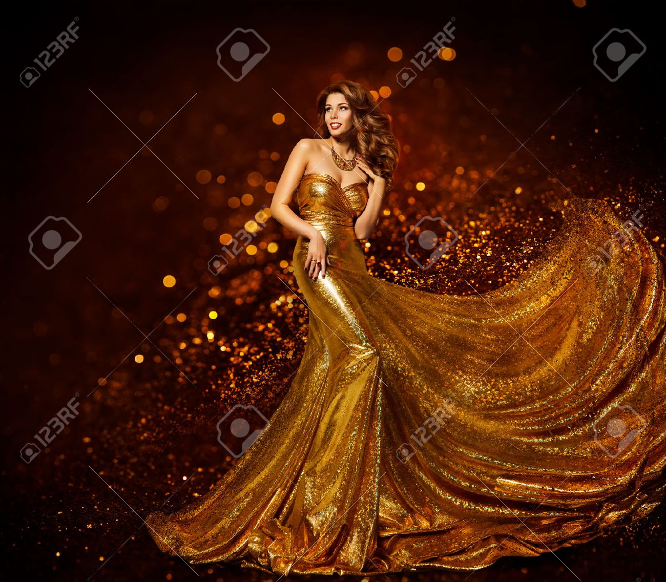 Fashion Woman Gold Dress, Luxury Girl in Elegant Golden Fabric Gown, Flying Sparkles Cloth - 68903872 Fashion Woman Gold Dress, Luxury Girl in Elegant Golden Fabric Gown, Flying Sparkles Cloth - 68903872