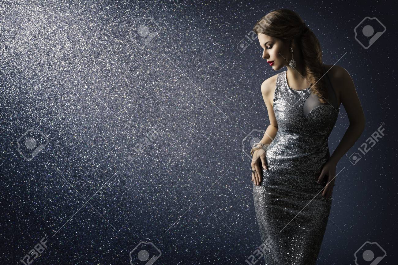 Silver Dress, Fashion Model Posing in Sparkling Sexy Gown, Elegant Woman Beauty Portrait on Lighting Sparkles Background - 97839046 Silver Dress, Fashion Model Posing in Sparkling Sexy Gown, Elegant Woman Beauty Portrait on Lighting Sparkles Background - 97839046