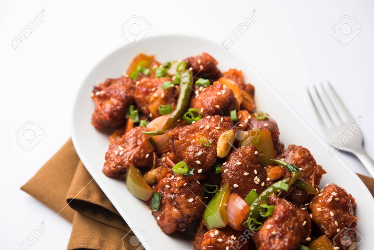 indian chilli chicken dry served in a plate over moody background stock photo picture and royalty free image image 112381780 indian chilli chicken dry served in a plate over moody background