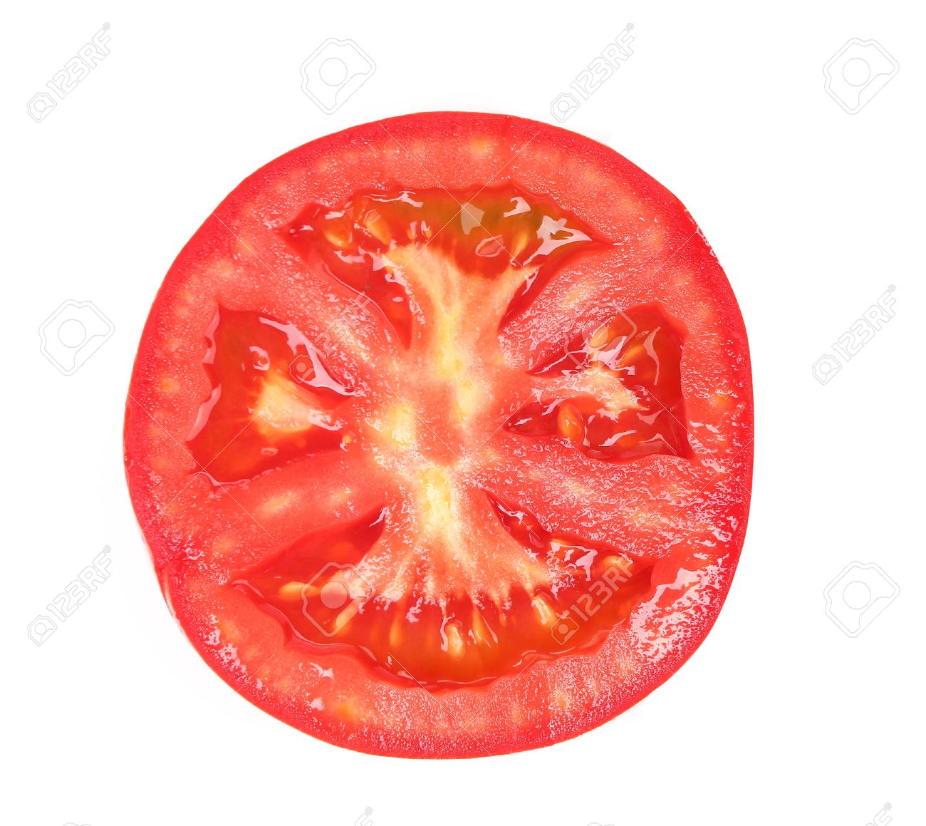 tomato slice isolated on white background top view stock photo