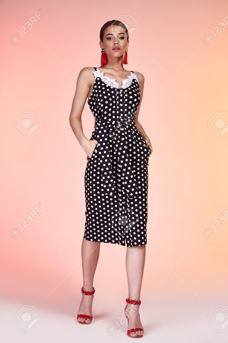 pink and black polka dot dress