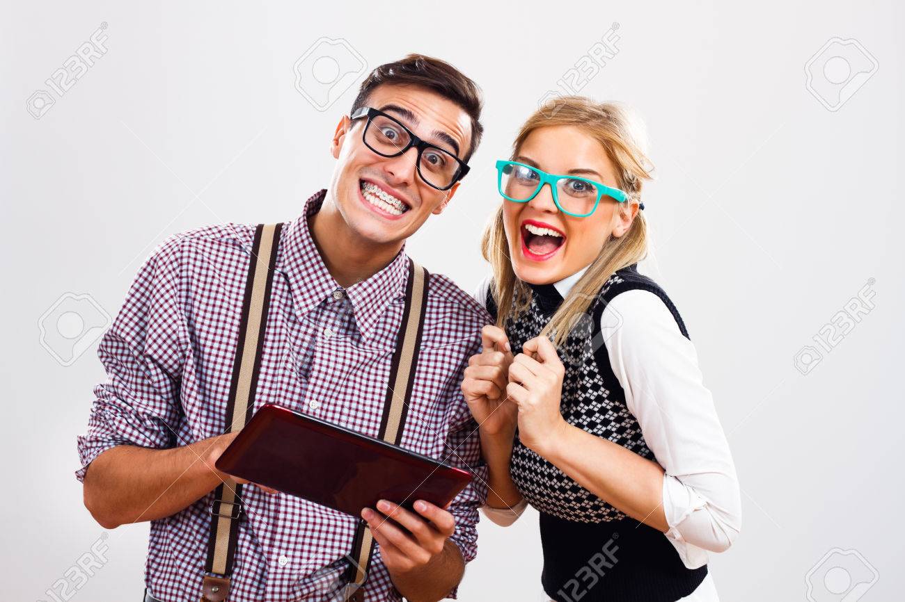 portrait of young nerds using digital tablet stock photo picture