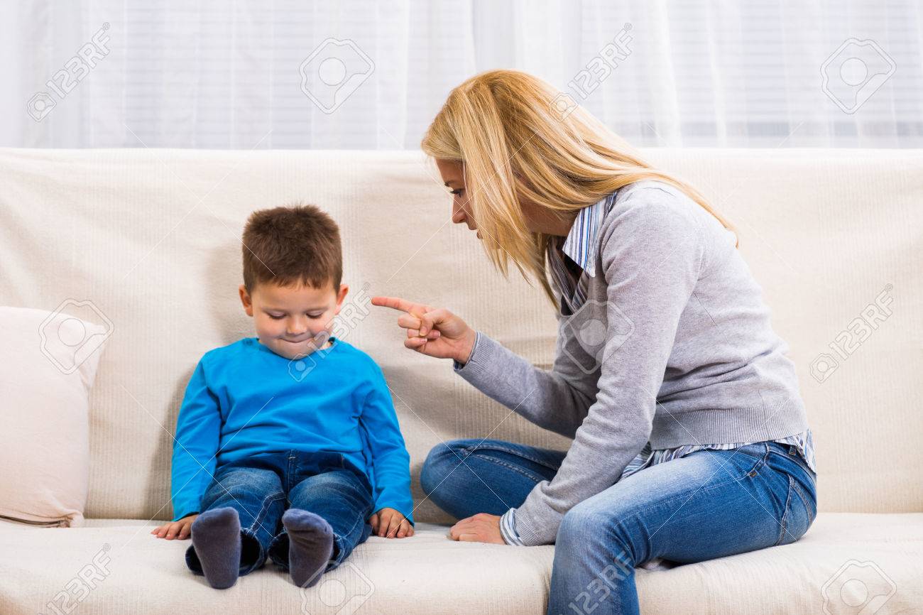 Angry Mother Is Scolding At Her Son. Stock Photo, Picture And Royalty Free Image. Image 66951801.