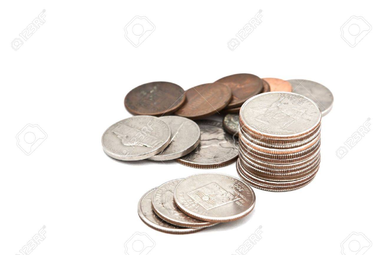 Coins And Loose Change On A White Background Stock Photo, Picture And  Royalty Free Image. Image 12001961.