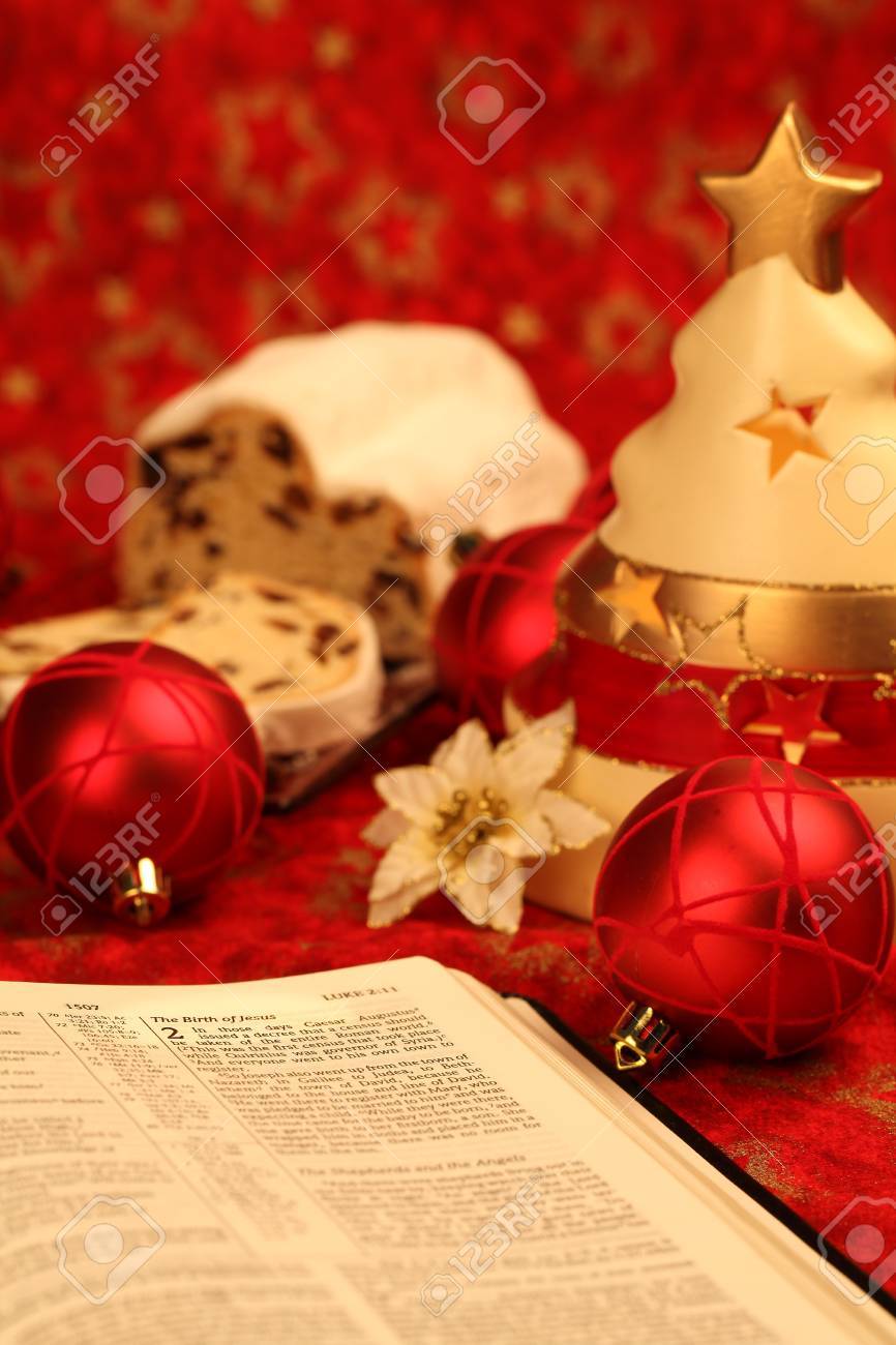 Bible Open To The Christmas Story And Stollen With Christmas