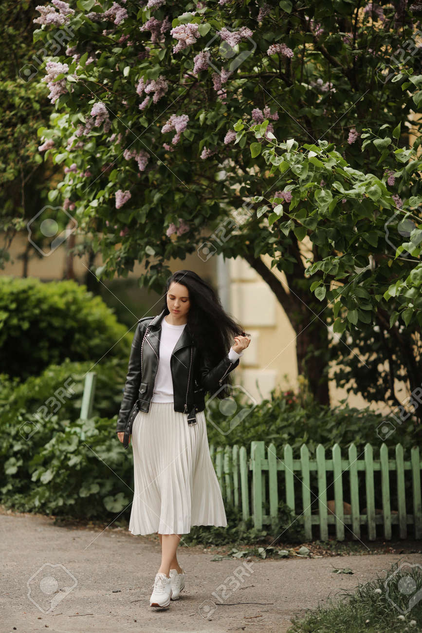 midi skirt and leather jacket