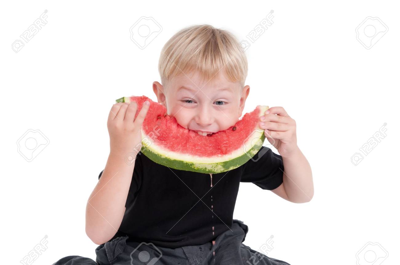 Kid Eating Hungrily A Slice Of Watermelon Stock Photo, Picture and Royalty  Free Image. Image 8125055.