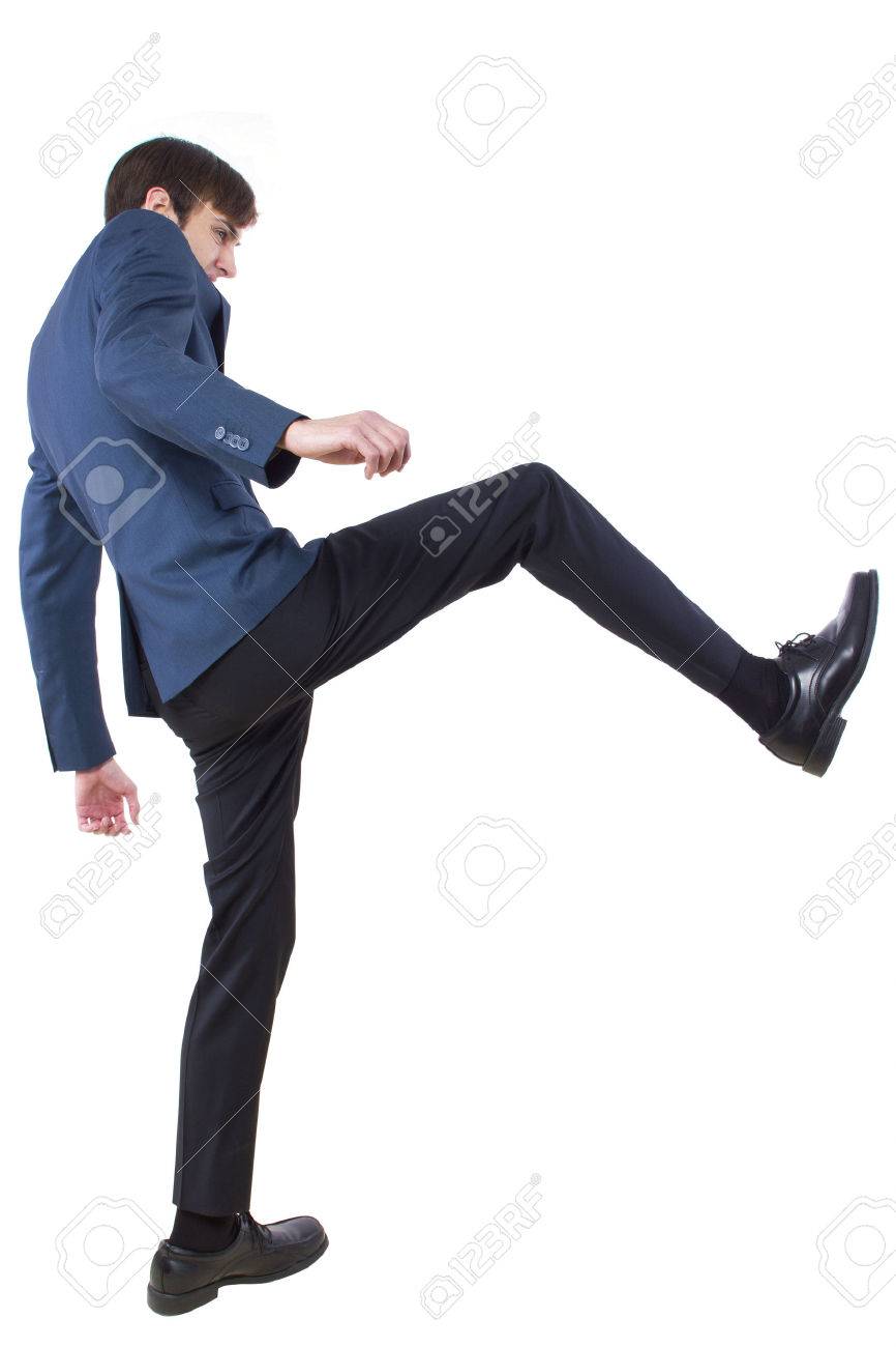 白い背景にポーズを蹴り若い白人実業家 の写真素材 画像素材 Image