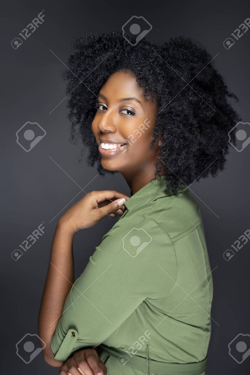 Black African American Fashion Model Posing With Afro Hairstyle