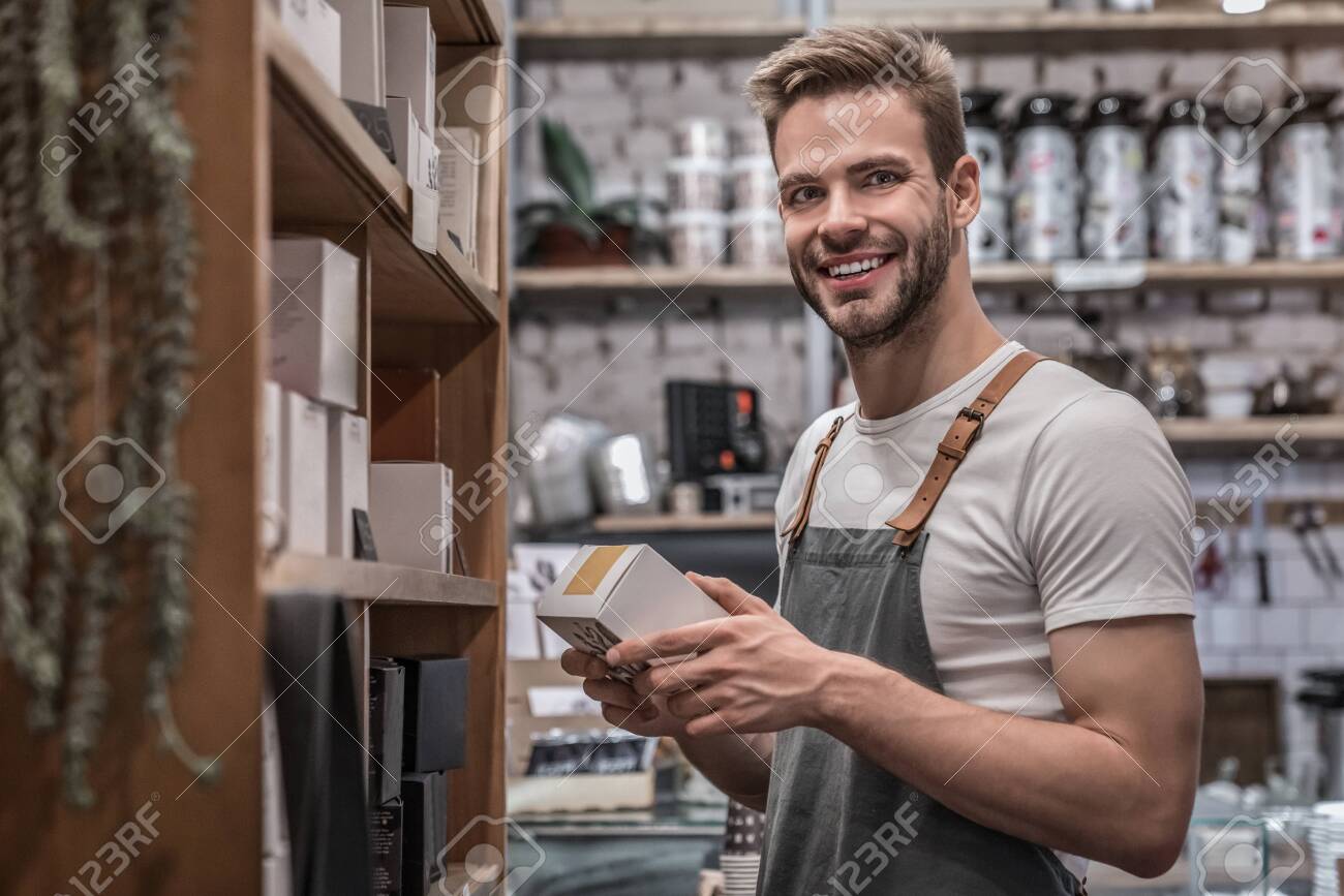 Portrait of small business owner working at his coffee shop - 138661941 Portrait of small business owner working at his coffee shop - 138661941