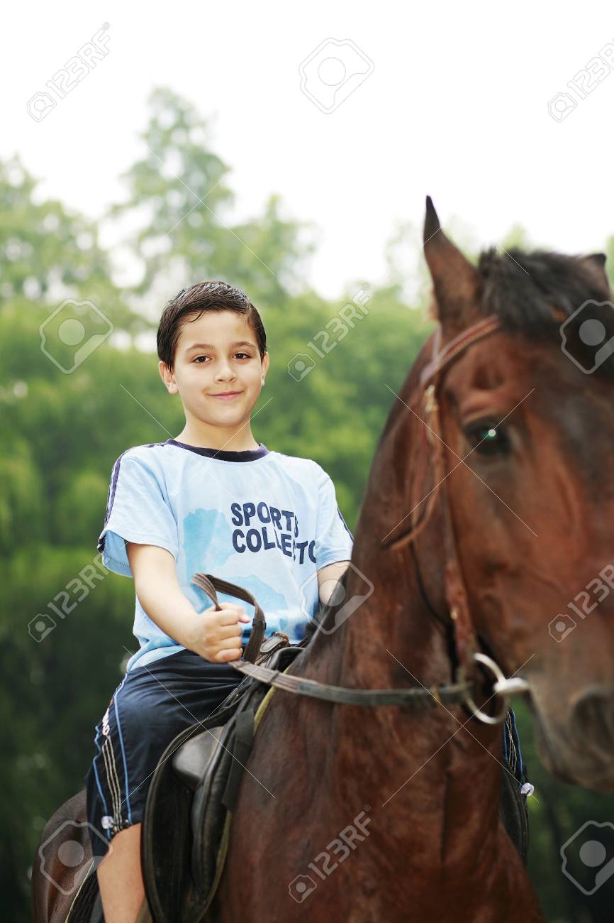 Boy Riding A Horse Free Image and Photograph 26200554., image size:866x1300