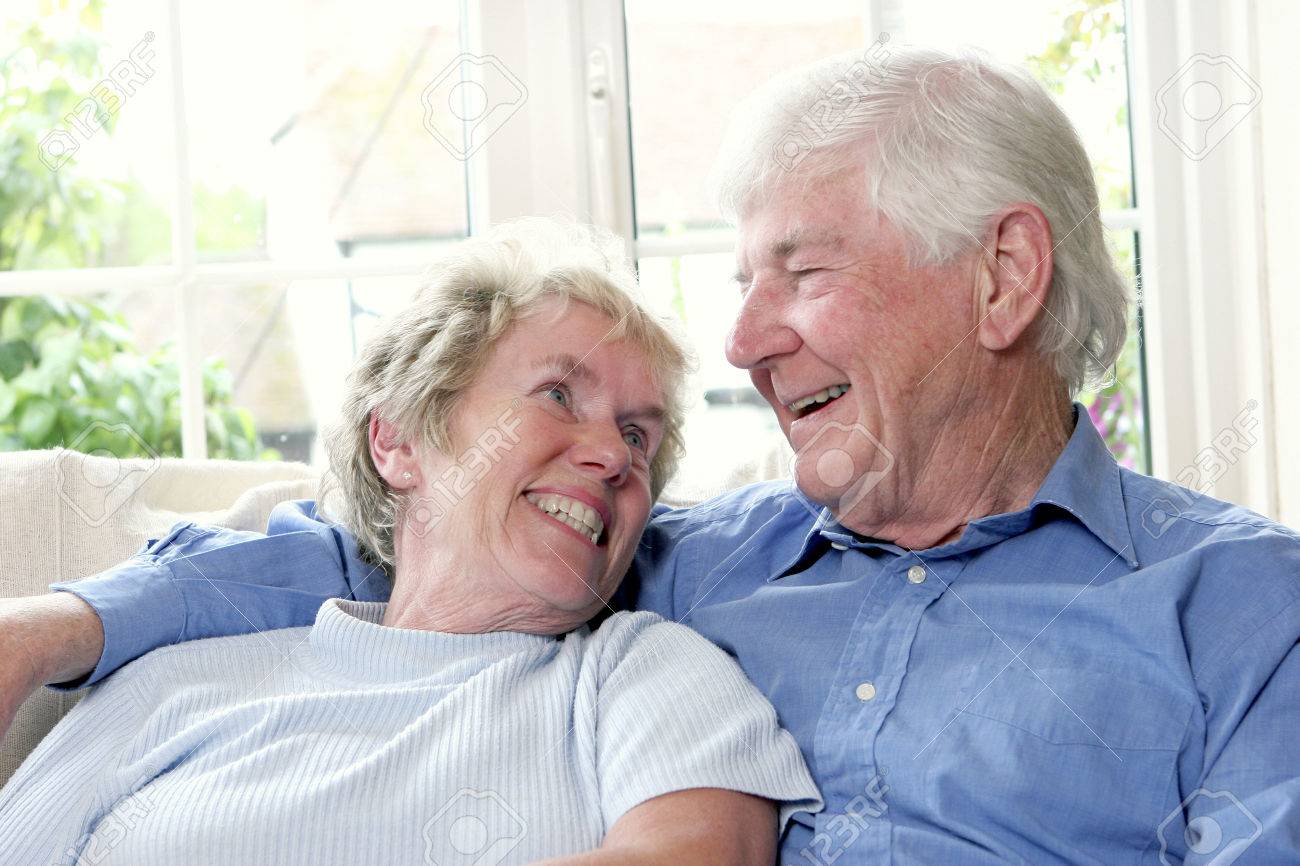 His Arm Around His Wife Stock Photo photo