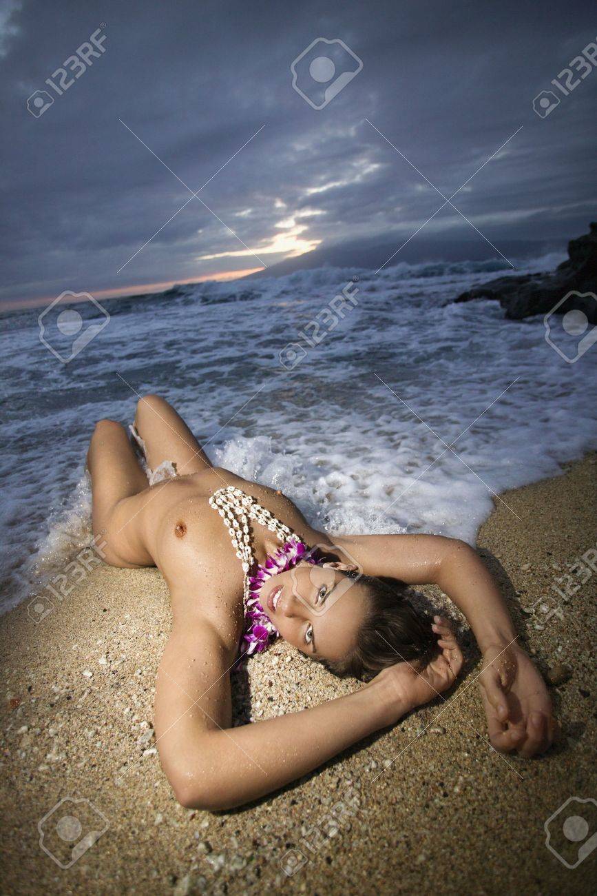 Young Caucasian Nude Woman Wearing Lei Lying In The Surf On A Maui, Hawaii,  USA Beach. Stock Photo, Picture and Royalty Free Image. Image 2168271.
