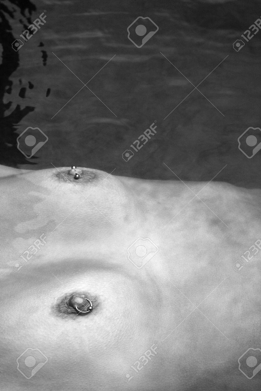 Young Adult Caucasian Female Floating In Water With Breasts. Stock Photo,  Picture and Royalty Free Image. Image 2188765.