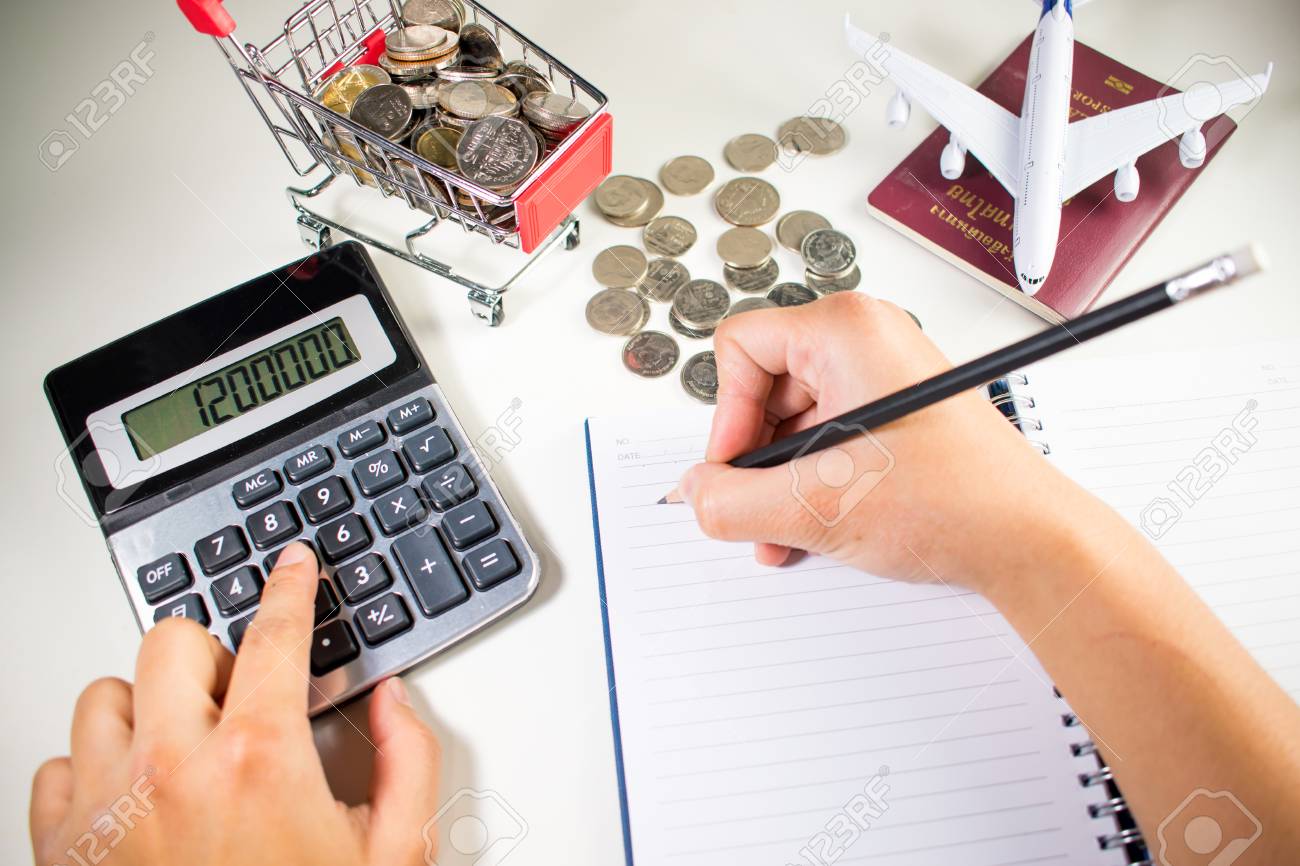 woman are calculating travel expenses asia thailand stock photo